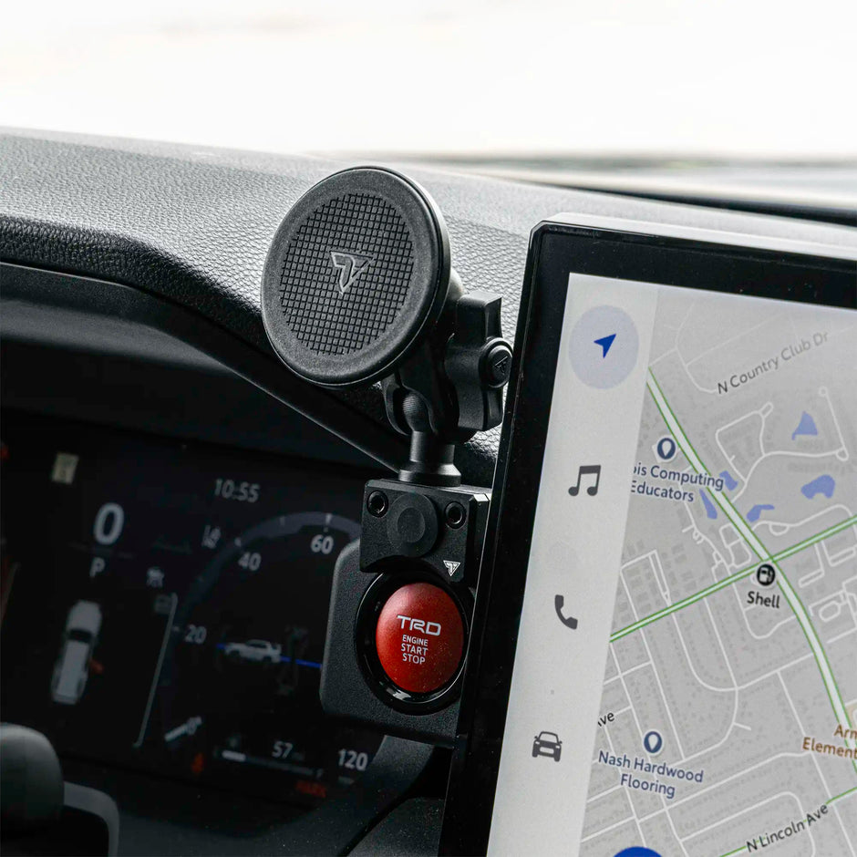 Toyota Tacoma Tackform dash clip phone mount holding a smartphone