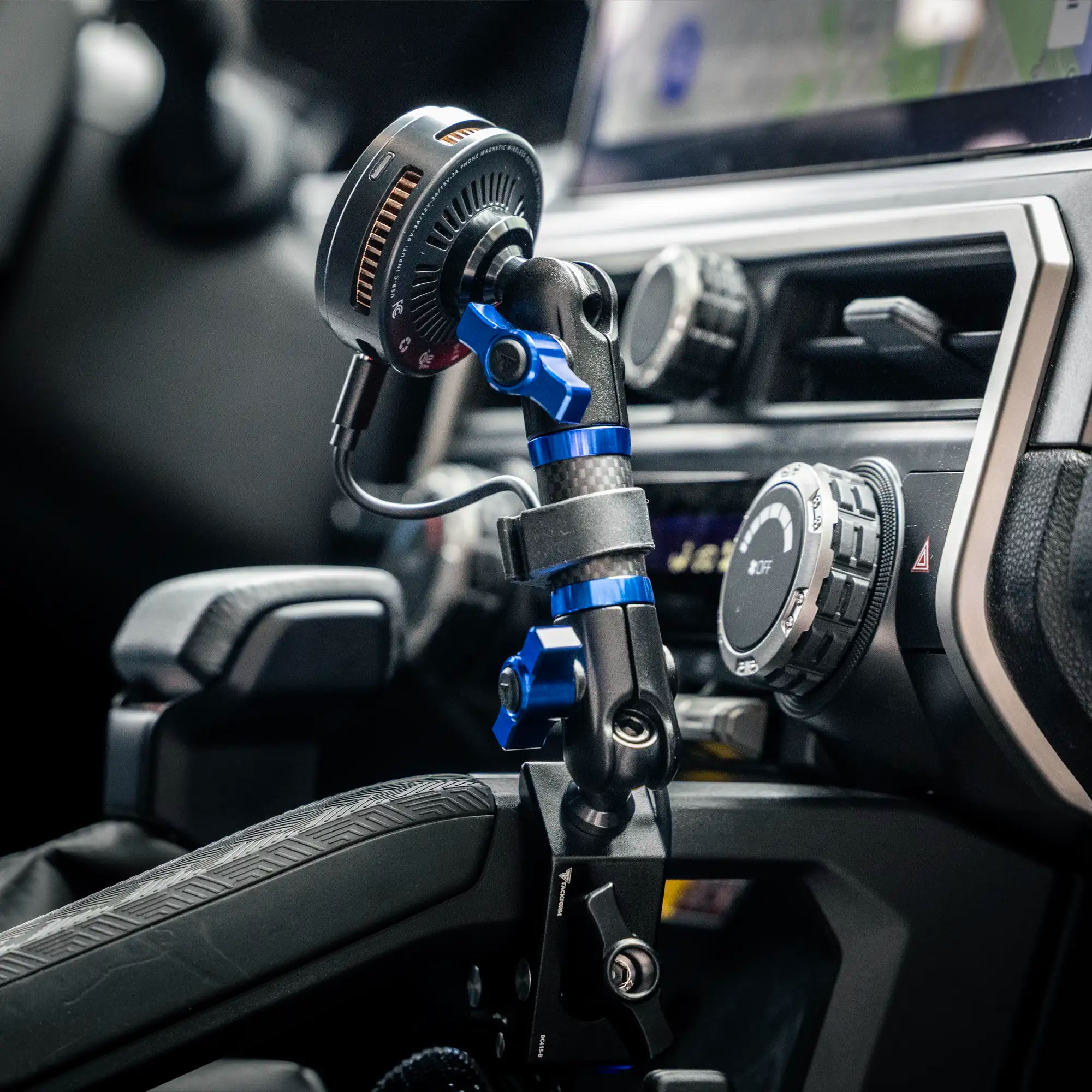 Toyota 4Runner Tackform grab handle phone mount holding a smartphone, interior view
