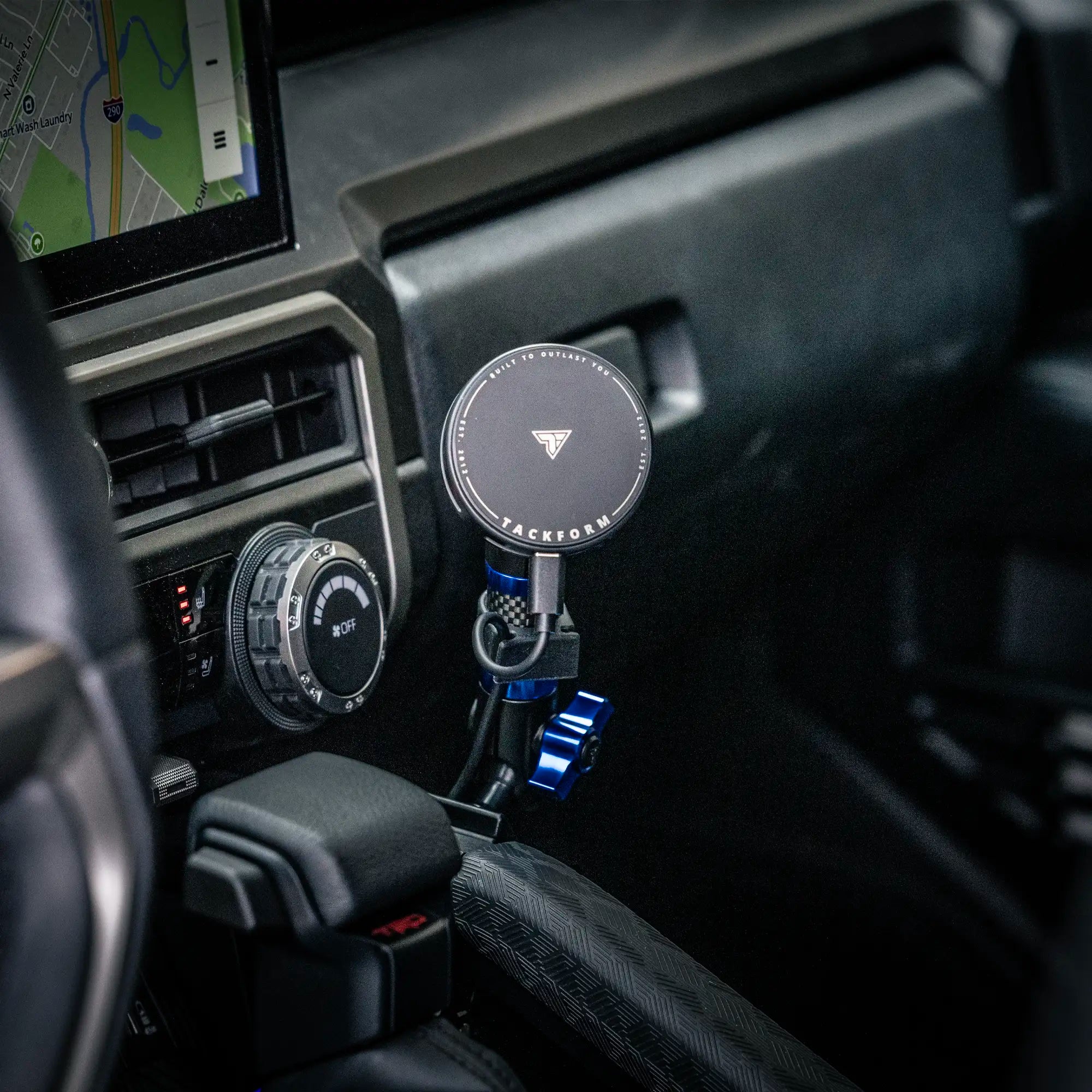 Passenger-side Tackform grab handle mount with phone holder in a 2025+ Toyota 4Runner