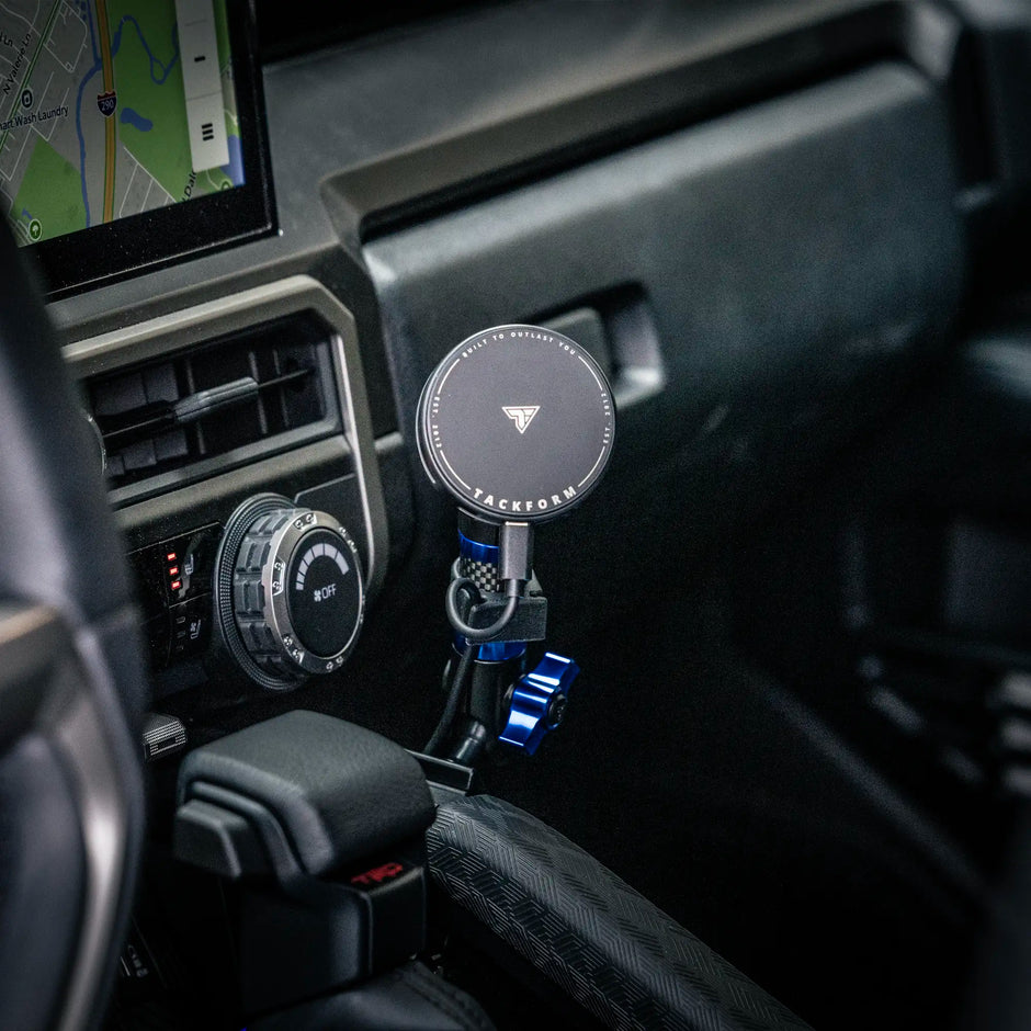 Passenger-side Tackform grab handle mount with phone holder in a 2025+ Toyota 4Runner